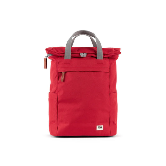Red rolltop backpack with grey grab handles