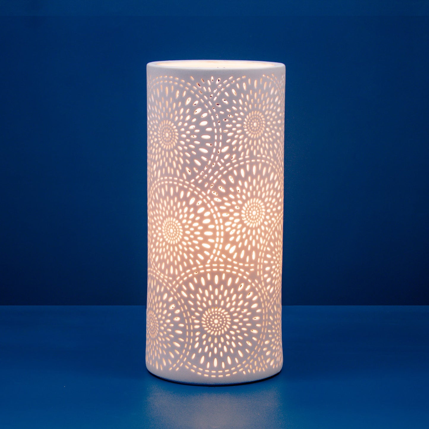 White porcelain column lamp with perforated firework design