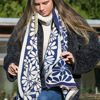 Model wearing navy and white reversible floral scarf