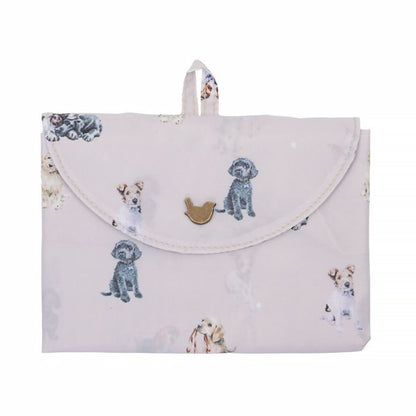 Folded grey shopping tote bag with dog pattern