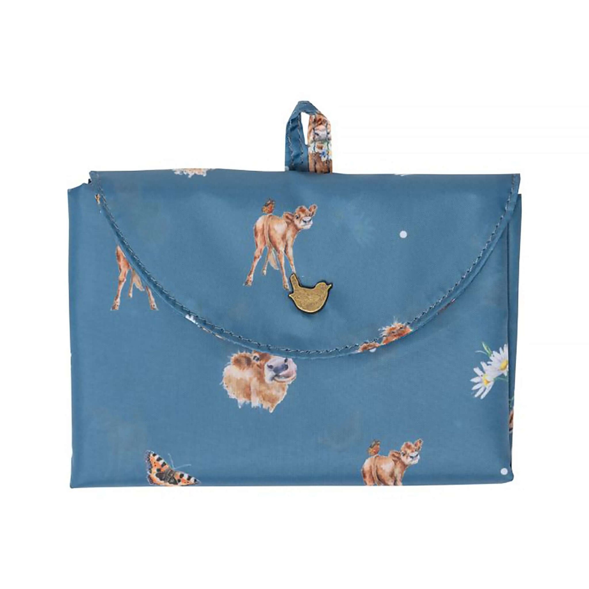 Folded blue shopping tote bag with Highland Cow pattern