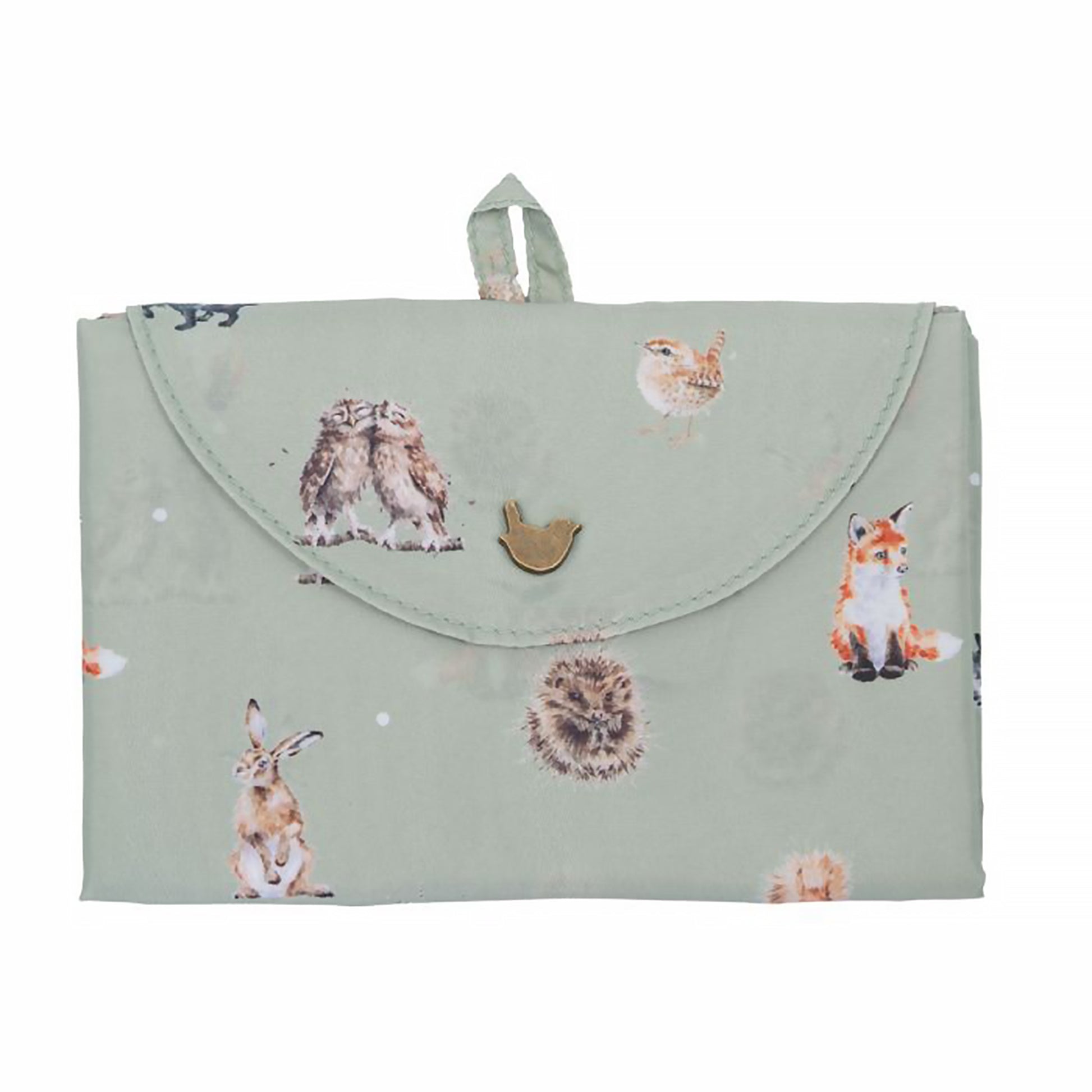 Folded green shopping tote bag with woodland animal repeat print