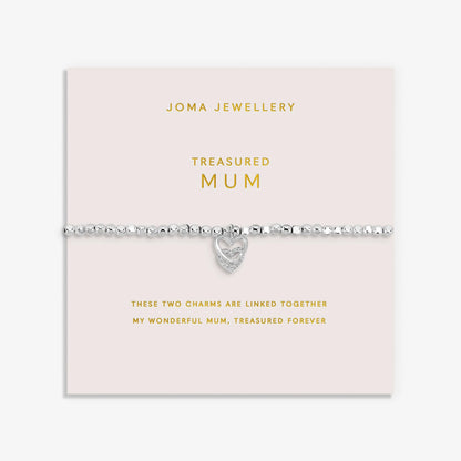 Silver bracelet with two interlinked hearts in silver and CZ, with a sentiment that reads 'Treasured Mum'