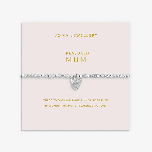 Silver bracelet with two interlinked hearts in silver and CZ, with a sentiment that reads 'Treasured Mum'