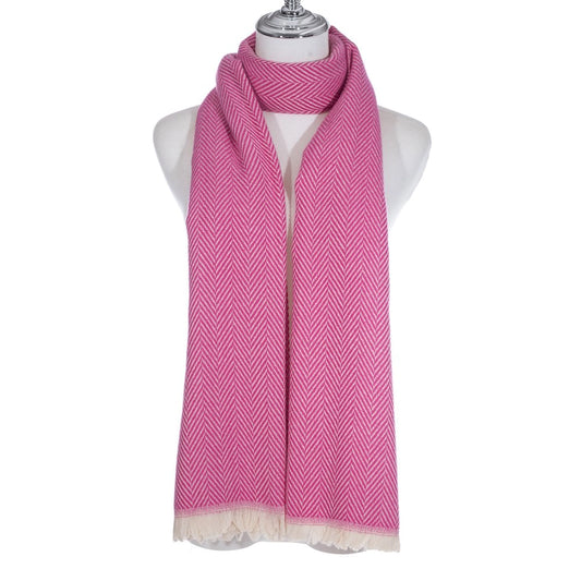 A long pink scarf with chevron pattern and short white fringe detailing