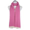 A long pink scarf with chevron pattern and short white fringe detailing