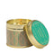 A gold tine candle with scandi style green pattern on brown paper in the scene 'Festive Wishes'