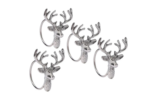 Four silver colour napkin rings with stag heads