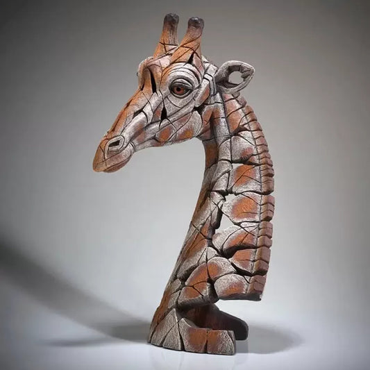 A textured and painted giraffe head bust sculpture side view