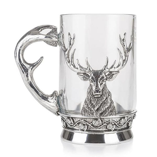 A glass tankard with a pewter stag and horn shaped handle
