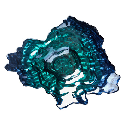 Decorative oyster shaped bowl with pearlescent turquoise and blue colours
