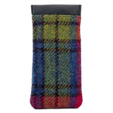 A Harris Tweed glasses sleeve in pink, green and blue check reverse