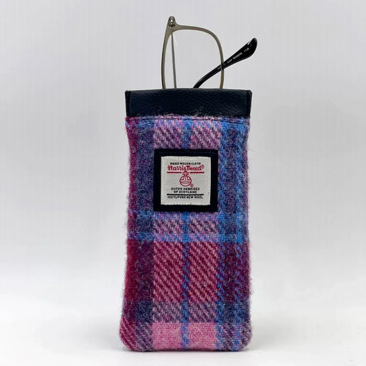 A Harris Tweed glasses sleeve in purple and pink check
