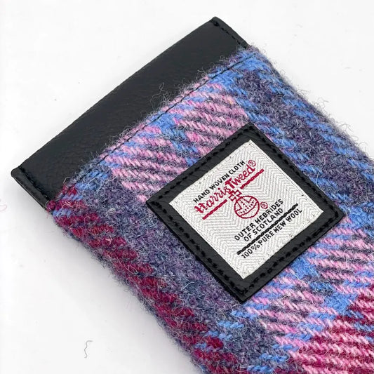 A Harris Tweed orb on glasses sleeve in purple and pink check