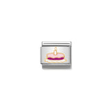A Nomination charm featuring a gold birthday cake with one candle and pink enamel