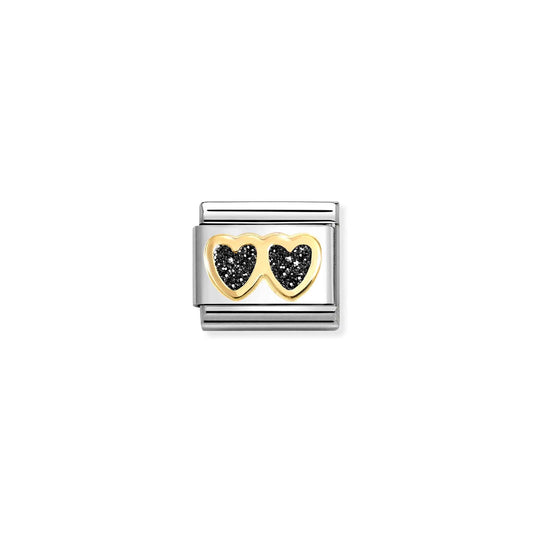 A Nomination link charm featuring gold double hearts in black glitter