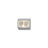 A Nomination charm link featuring two gold hearts with silver glitter centres