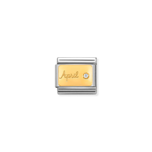 A Nomination charm link featuring a gold plaque engraved with 'April' and set with a round diamond stone