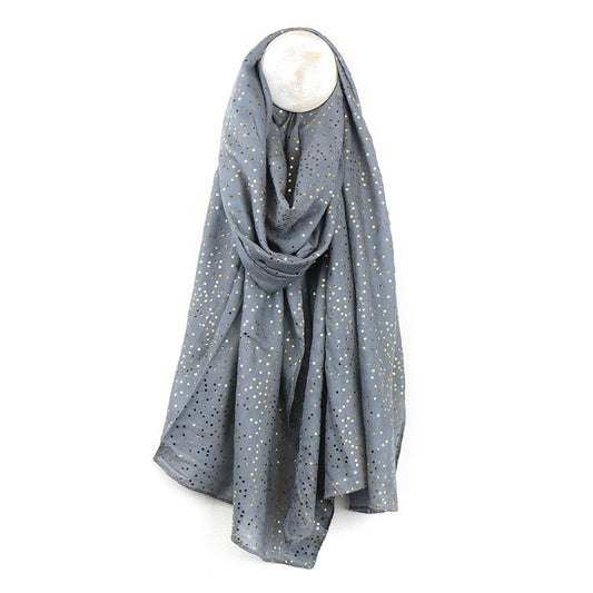 A light blue grey scarf with gold foil speckle pattern