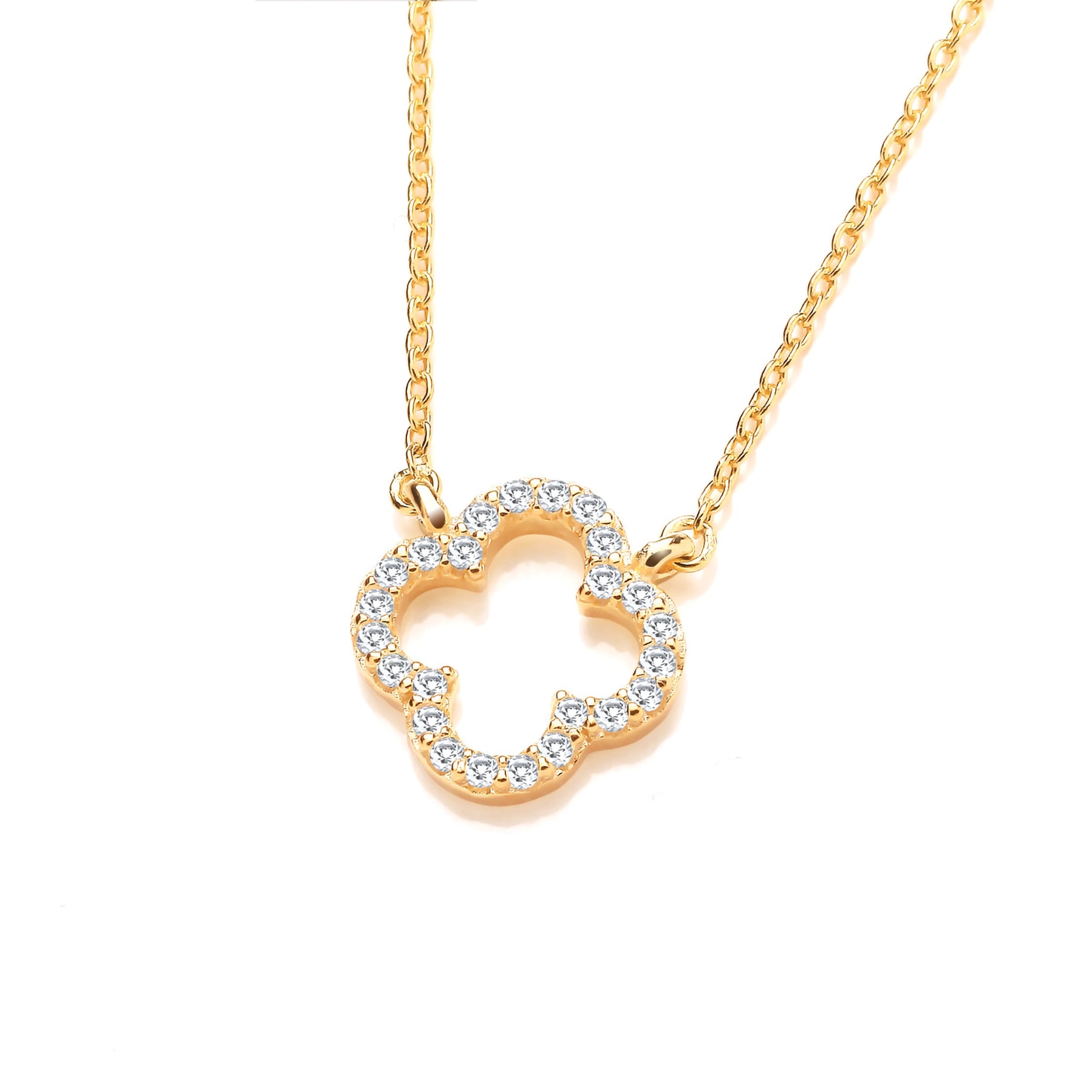 An open clover shaped gold necklace with cubic zirconia stones