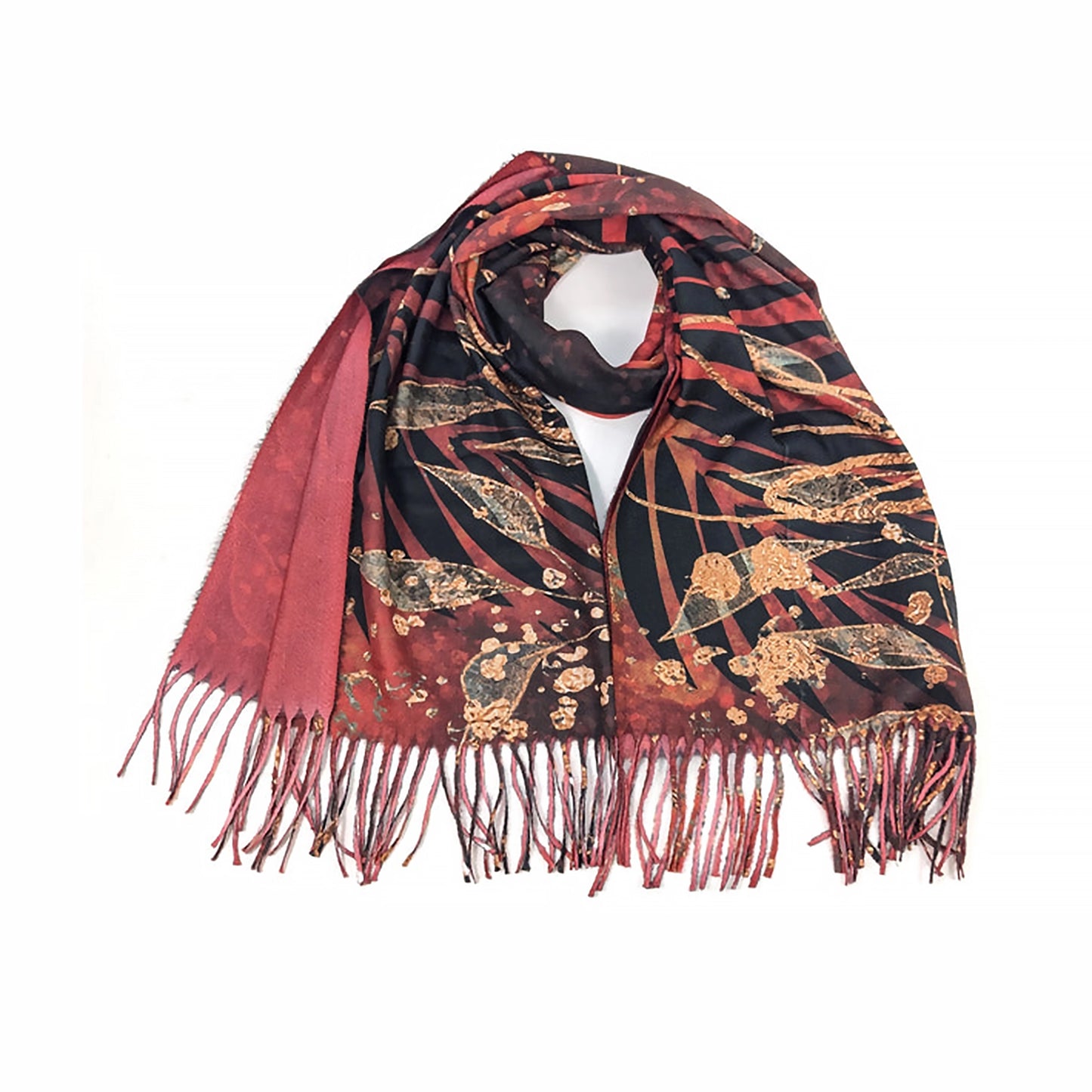 A red pashmina tassel scarf with black and gold foil leaf design