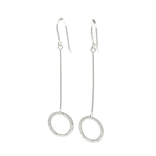 Pair of extra long silver drop earrings with open hammered circles at the bottom of long thin bars
