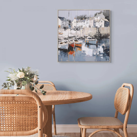 Framed canvas of a traditional coastal scene created using broad brush strokes in a muted colour palette hanging