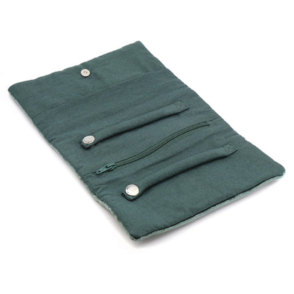 Open dark green velvet jewellery roll with two snap ring rolls and a zip pocket