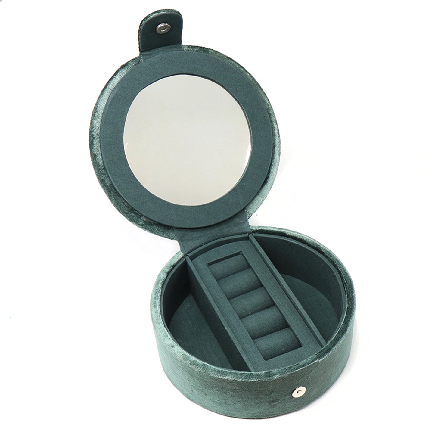 A round dark green velvet jewellery box with two open compartments and a ring roll