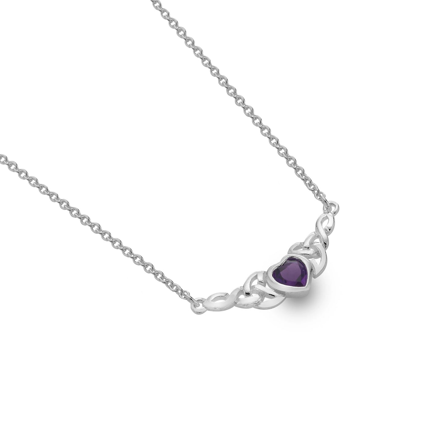A silver chain necklace with two trinity knots holding a faceted amethyst heart stone