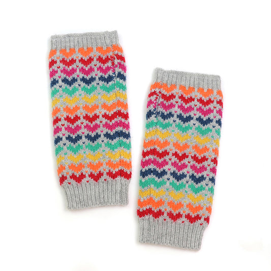 A pair of grey wrist warmers with bright rainbow repeat hearts pattern