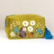 A velvet makeup bag embroidered with hedgehog and flowers