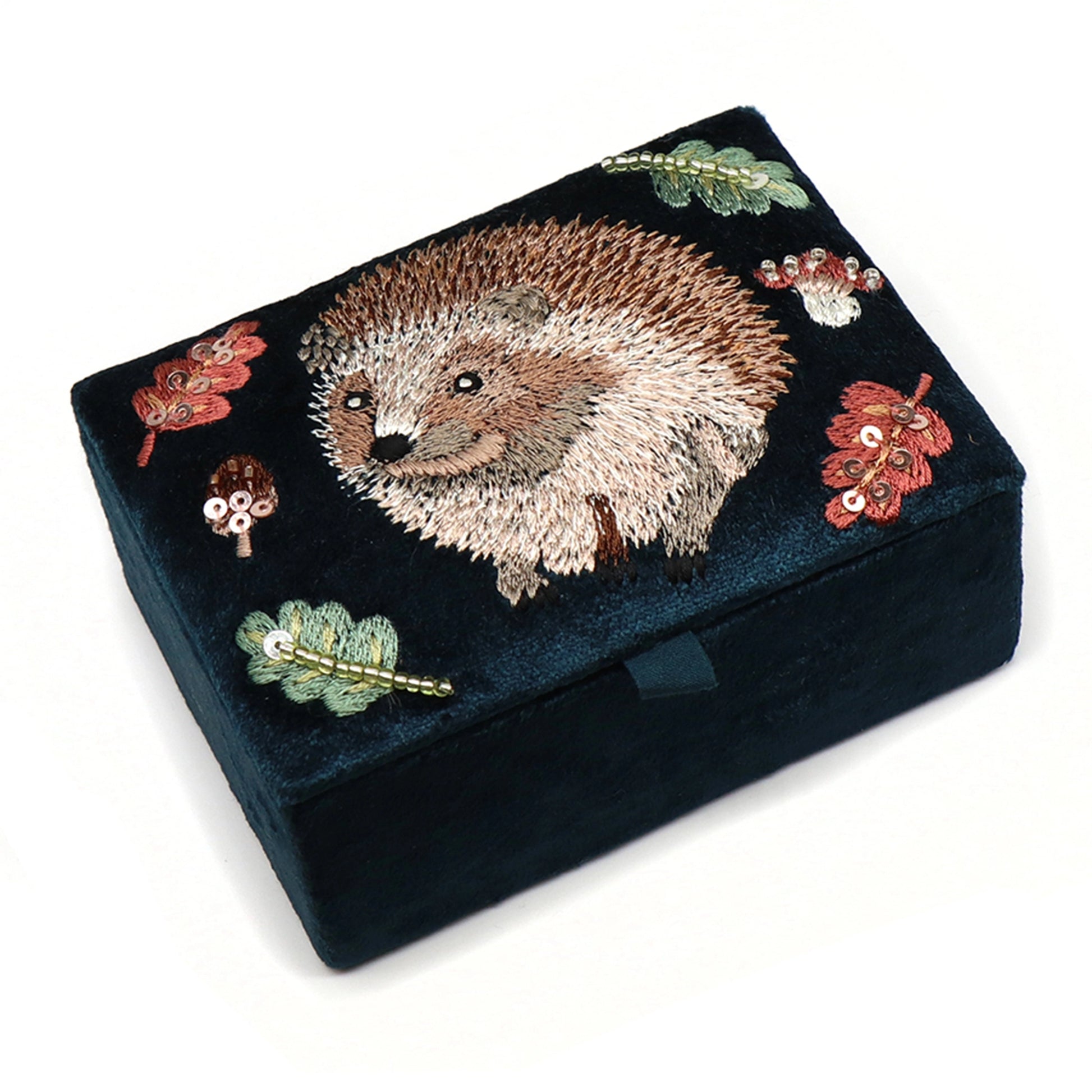 A rectangle dark teal velvet jewellery box with an embroidered and beaded hedgehog design