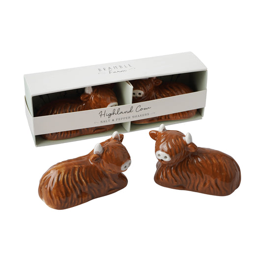 A pair of ceramic Highland cow salt & pepper shakers
