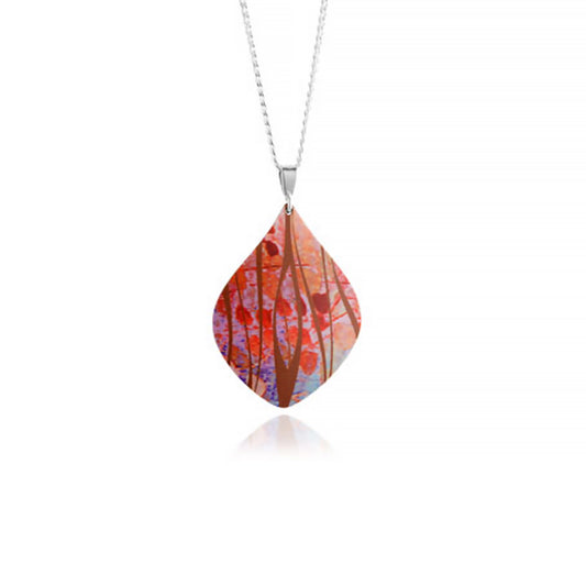 A curved aluminium pendant with abstract and brightly coloured modern design print