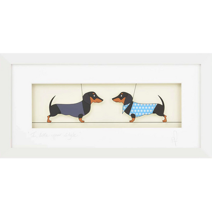Acrylic framed wall art featuring two dachshund dogs in outfits