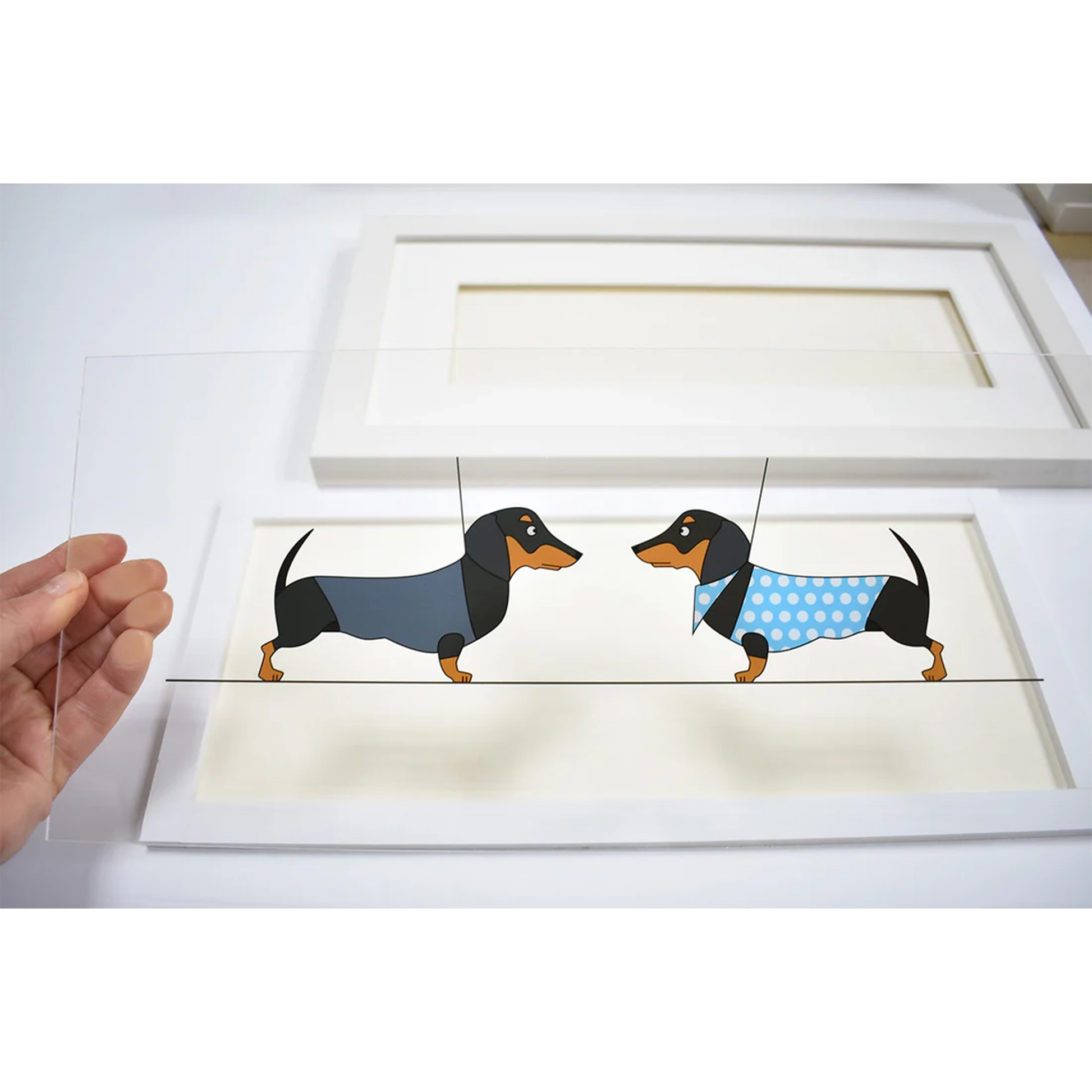 Acrylic art insert featuring two dachshund dogs in outfits