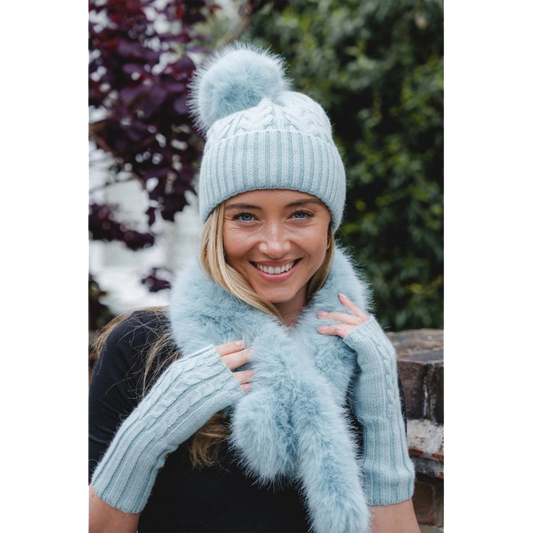 Model wearing a light blue coloured faux fur pull through scarf