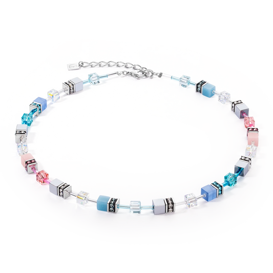 A steel necklace featuring soft blue and pink cube stones and beads