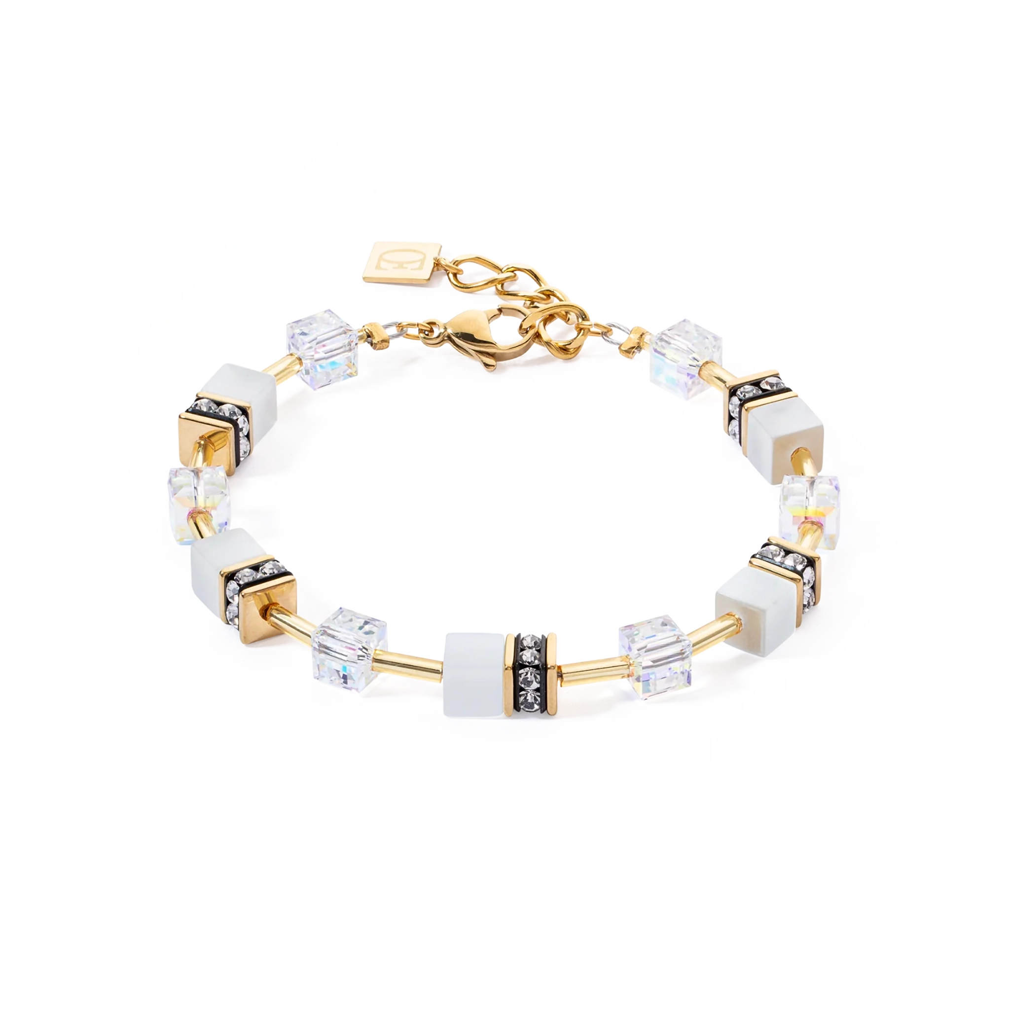 A gold steel bracelet with white cube beads and stones
