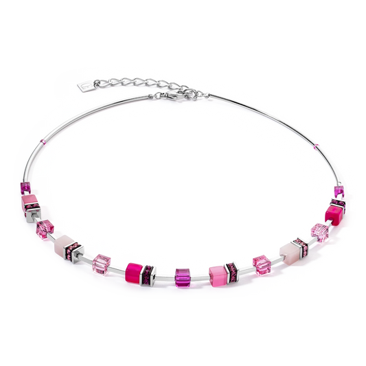 A bright pink beaded stainless steel necklace