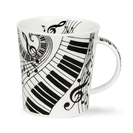 A white mug featuring black musical notes and piano keys