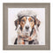 A framed art print of a jack russel dog wearing a hat and scarf