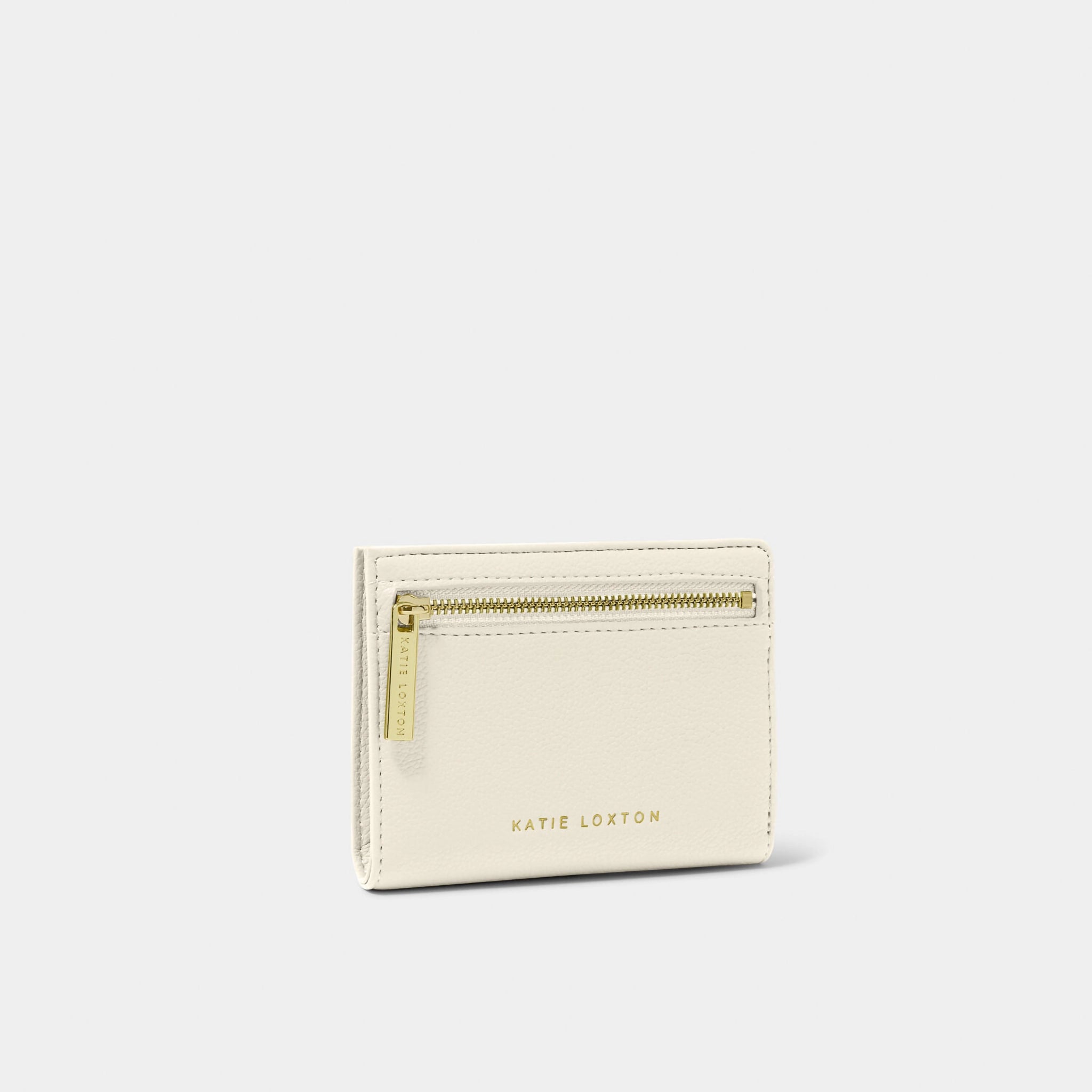 A little ecru purse branded with 'Katie Loxton' and featuring a gold zip