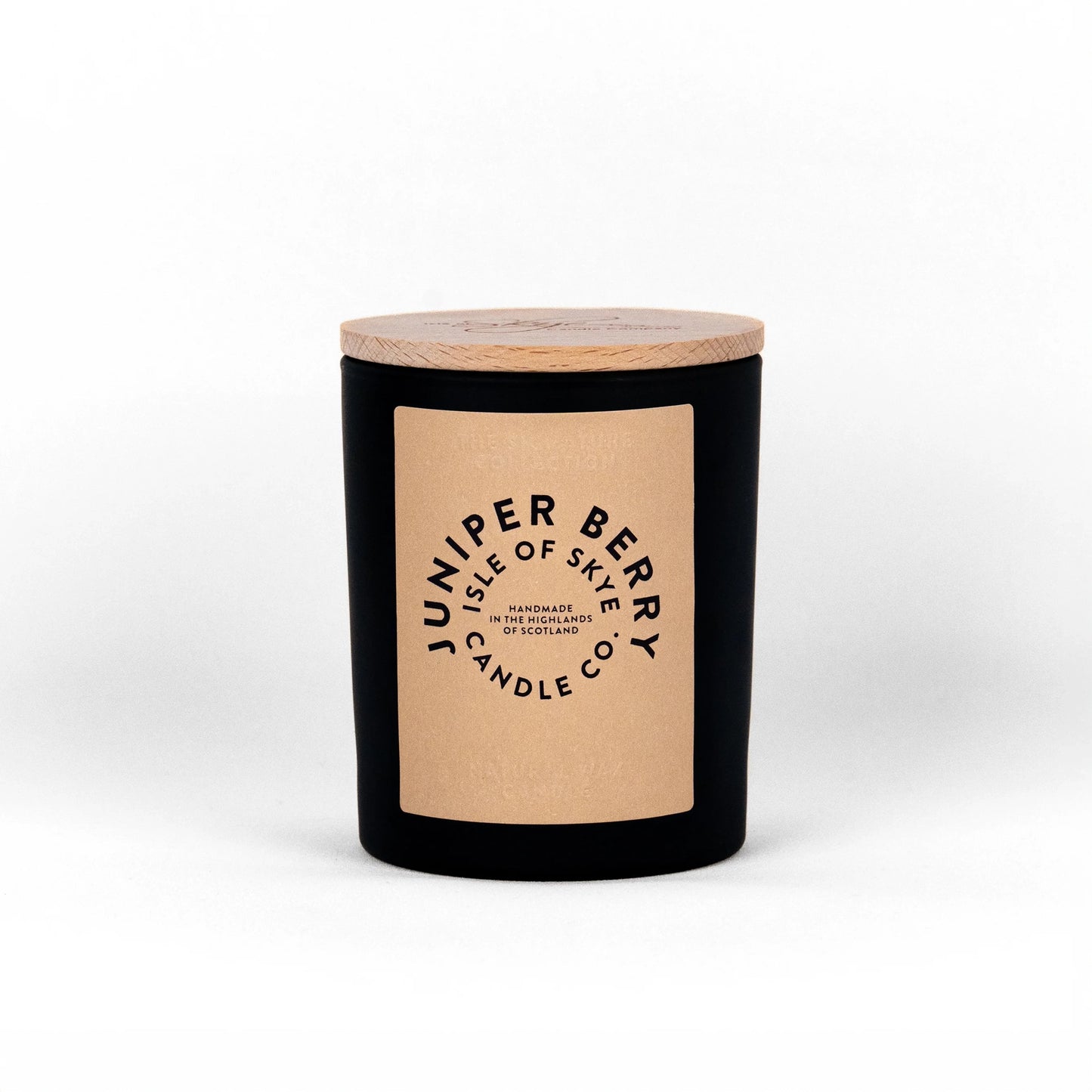 Juniper berry scented candle in black tumbler container