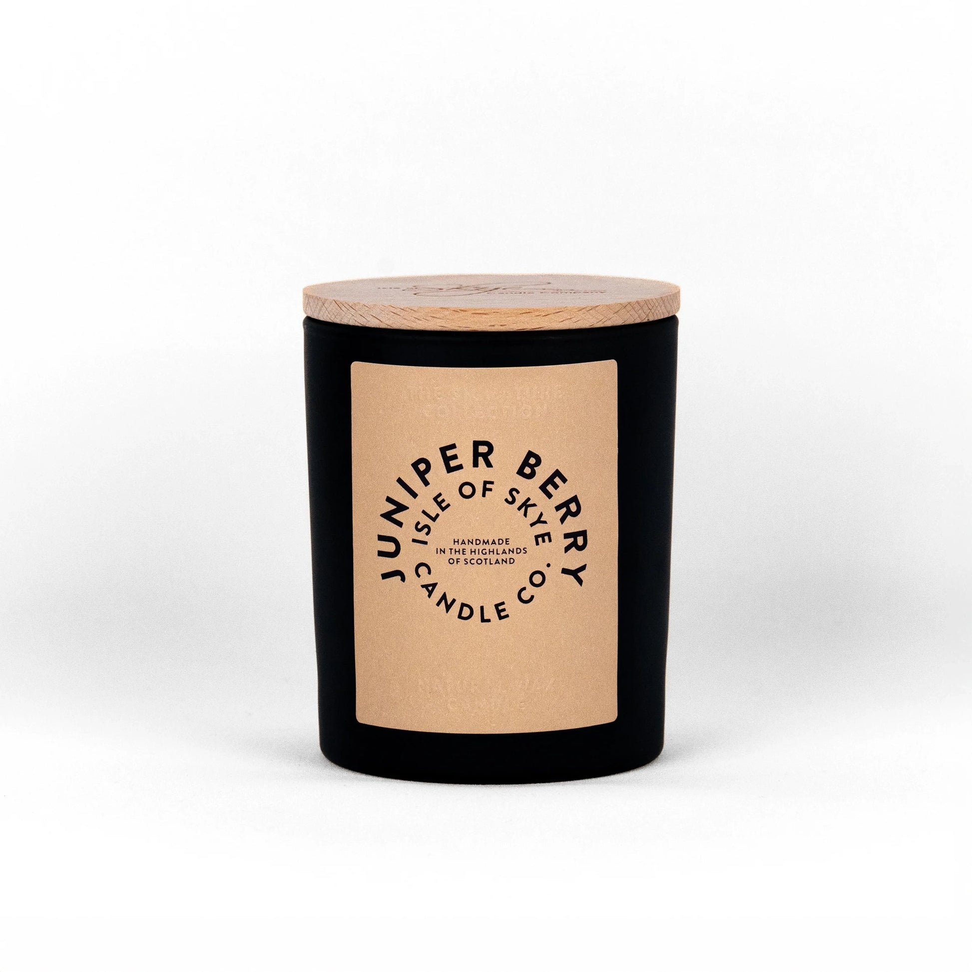 Juniper berry scented candle in black tumbler container