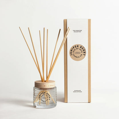 Juniper berry scented reed diffuser in glass container with box
