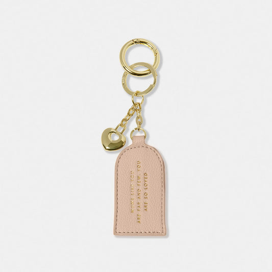 A long faux leather keyring with gold lettering and gold heart charm