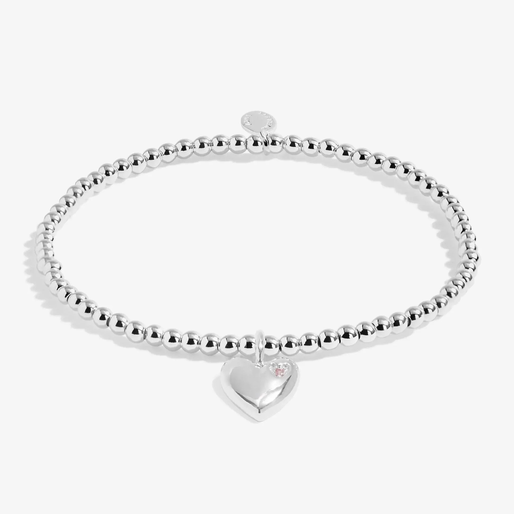 Kids silver beaded bracelet with heart charm set with purple CZ stone