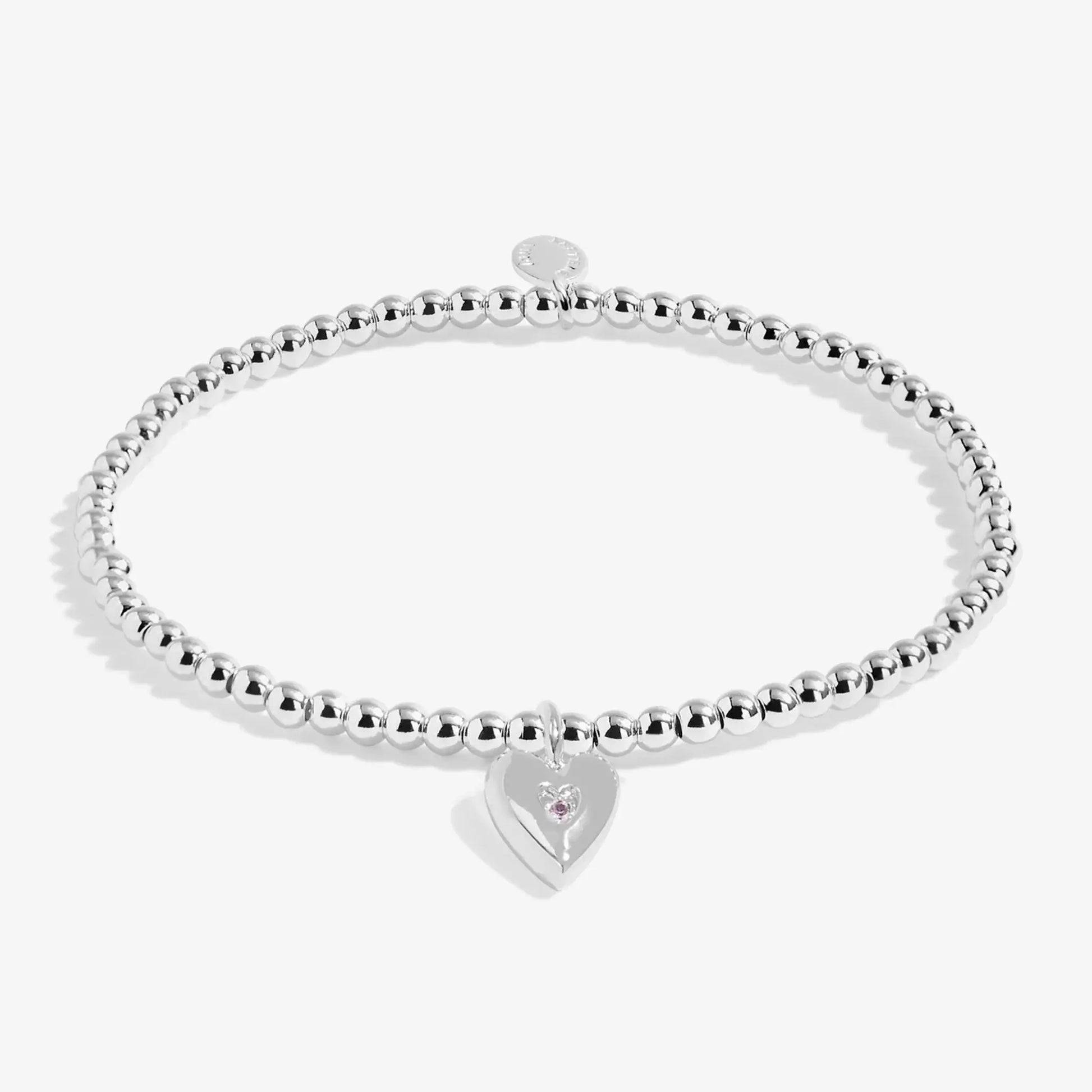 Kids silver beaded bracelet with silver heart set with purple CZ stone